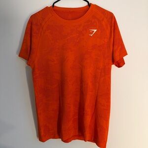 Gymshark Men’s Bright Orange Performance Tee with Subtle Camo